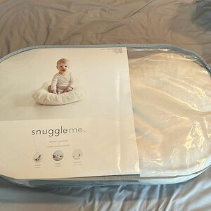 Snuggle me organic with natural color cover.